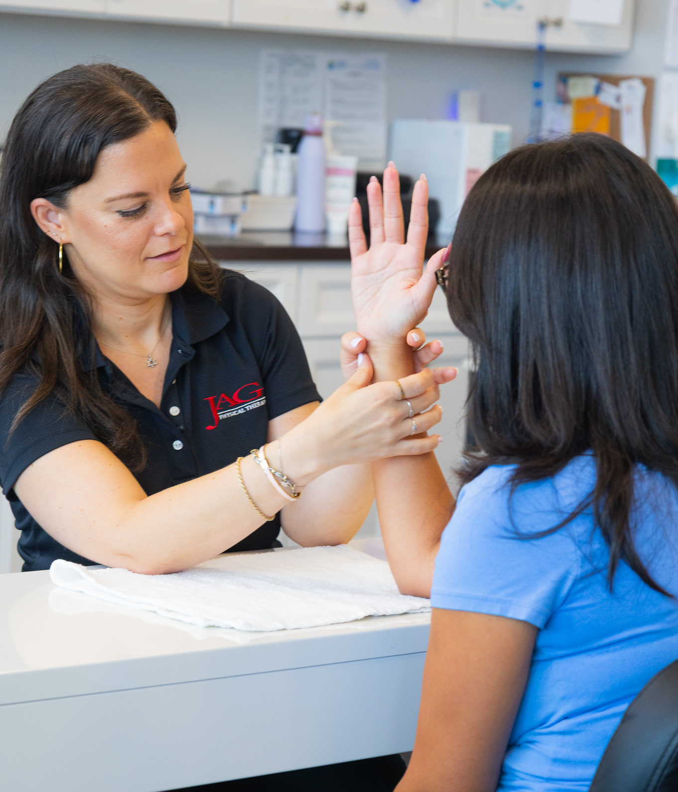 hand_therapist_with_patientCROP hand_therapist_with_patientCROP